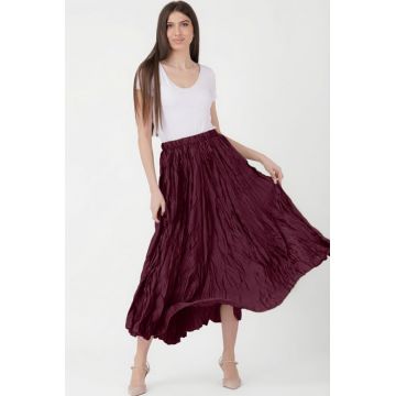 Fusta lunga, ampla, creponata, lucios-satinata, visinie